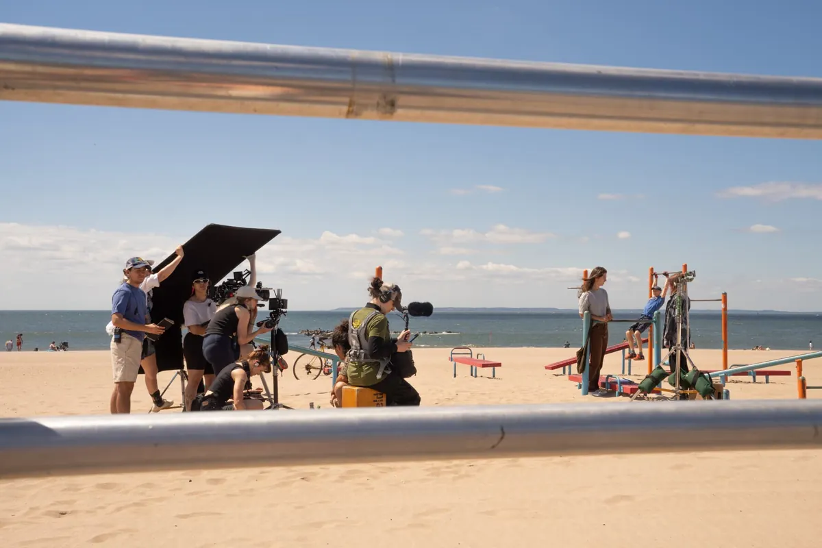 Behind the scenes — filming on the beach at Coney Island with the crew