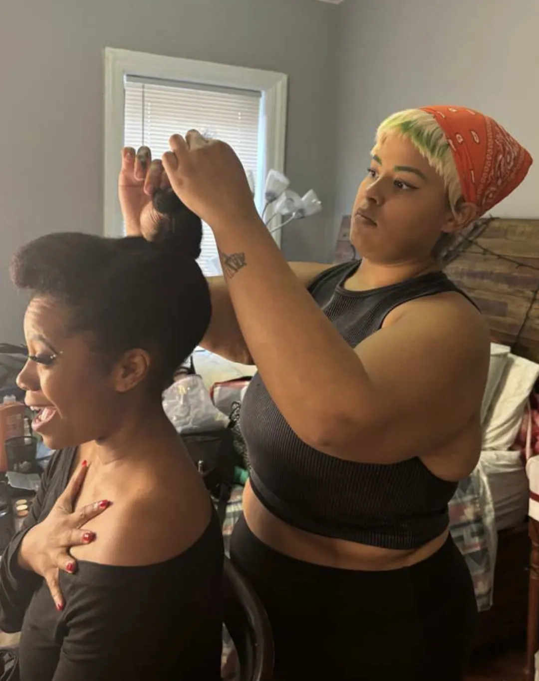 Behind the scenes on Divine Intervention — hair and makeup prep on set